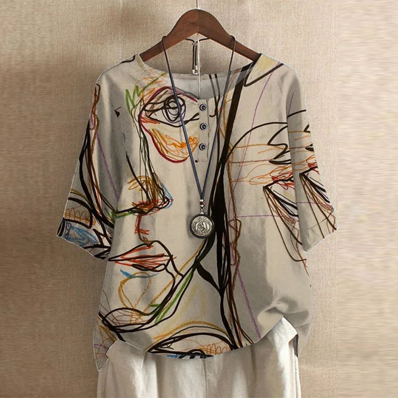 Bella women's vintage floral print blouse with short sleeves and a round neckline. 10