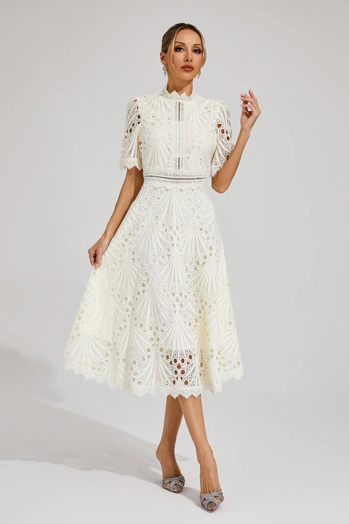 Luxe women’s midi dress featuring elegant lace details and a versatile silhouette, perfect for any occasion. 9