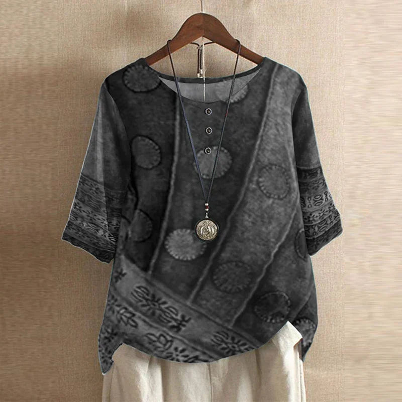 Bella women's vintage floral print blouse with short sleeves and a round neckline. 1