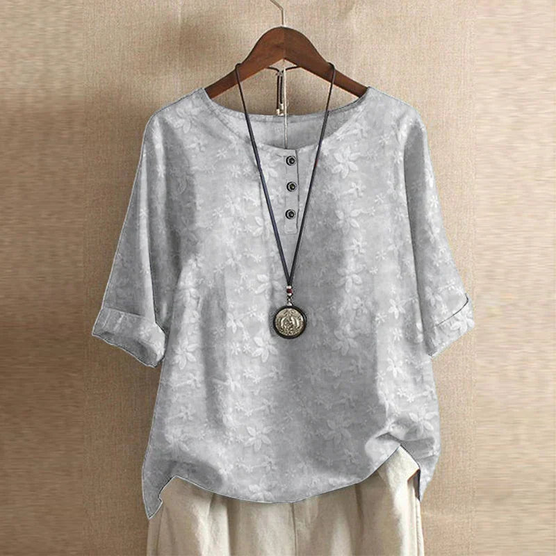Bella women's vintage floral print blouse with short sleeves and a round neckline. 5
