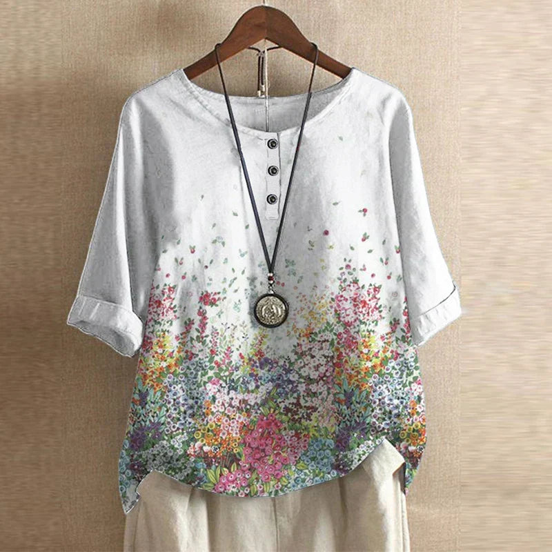Bella women's vintage floral print blouse with short sleeves and a round neckline. 6
