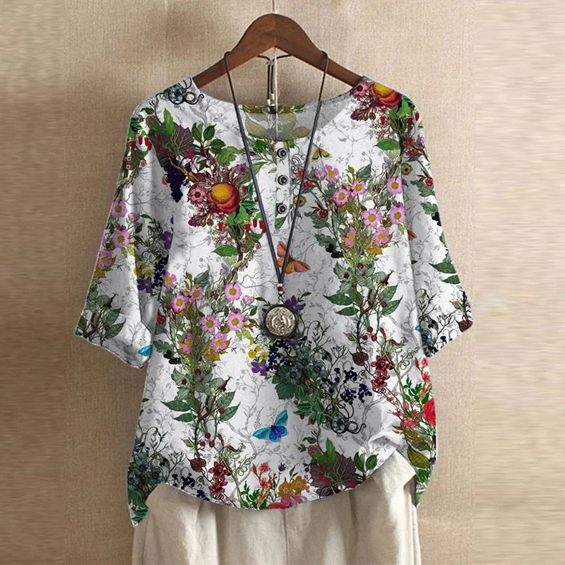 Bella women's vintage floral print blouse with short sleeves and a round neckline. 9
