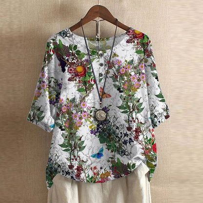 Bella women's vintage floral print blouse with short sleeves and a round neckline. 9