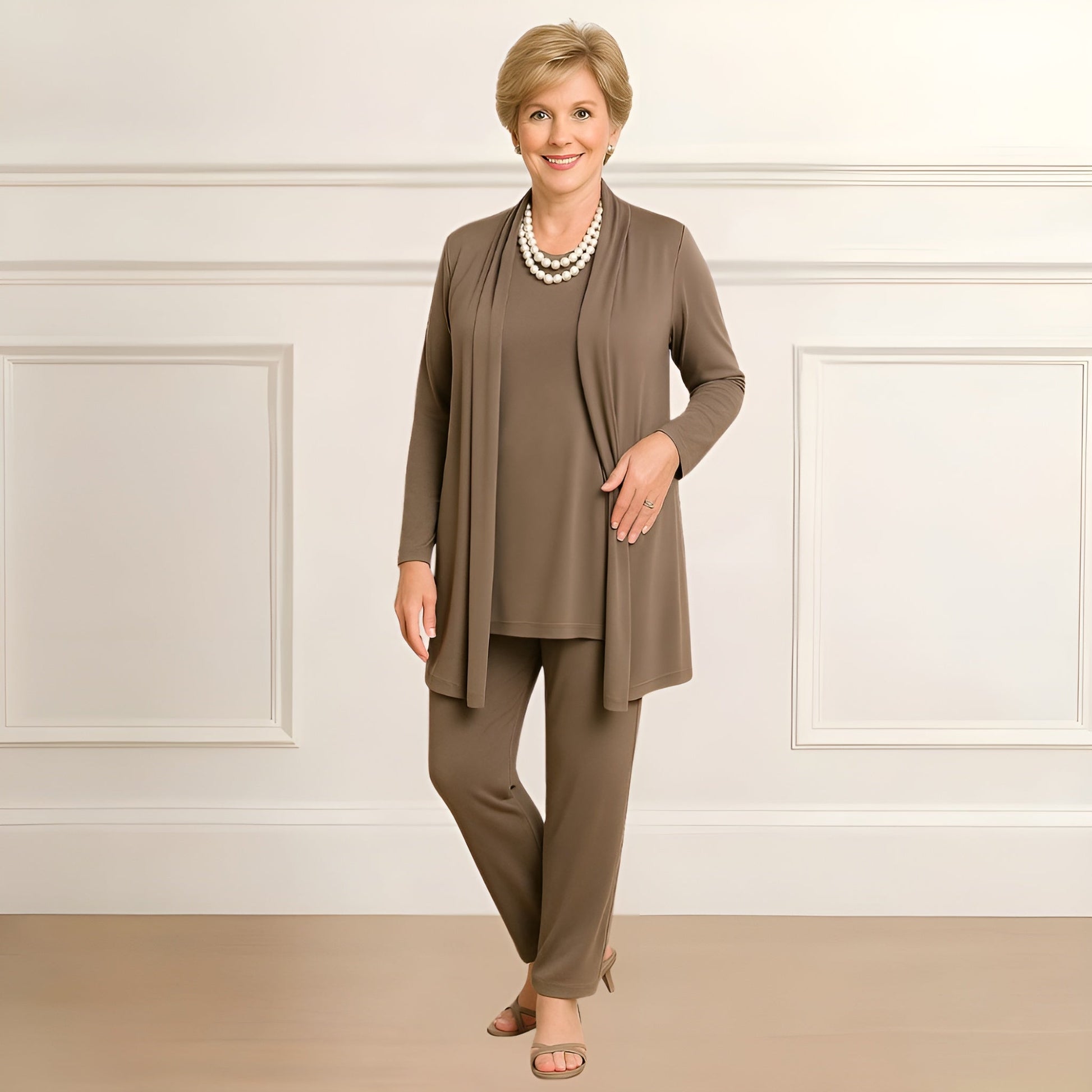 Dalia women's set featuring a stylish cardigan and round neck pants in a chic design, perfect for casual and elegant occasions. 0