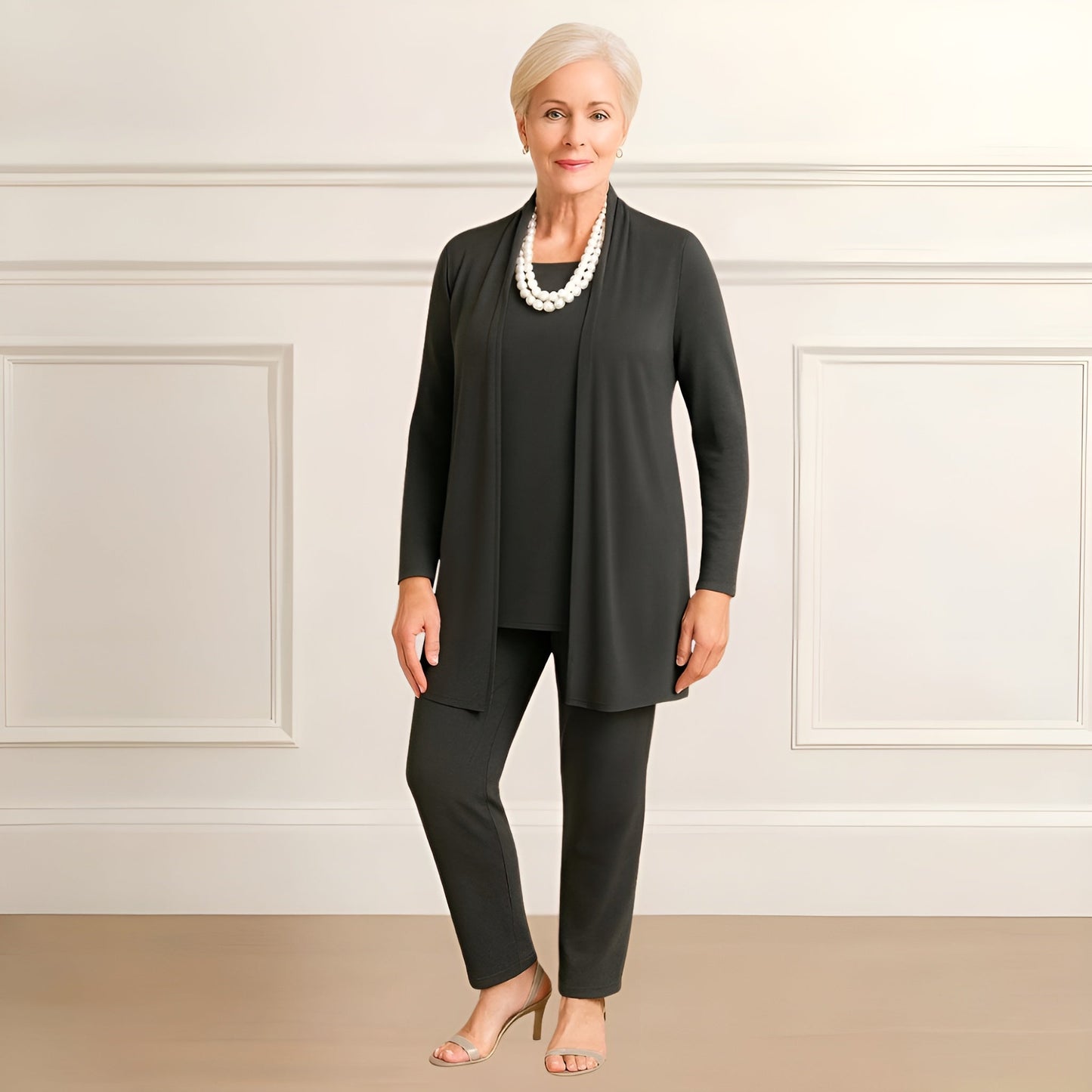 Dalia women's set featuring a stylish cardigan and round neck pants in a chic design, perfect for casual and elegant occasions. 4