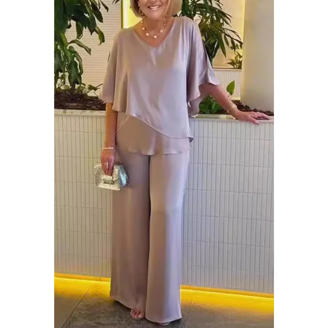 Damski elegancki komplet dwuczęściowy z warstwową bluzką i szerokimi spodniami