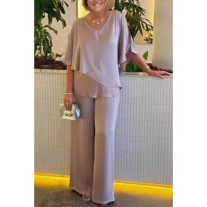 Damski elegancki komplet dwuczęściowy z warstwową bluzką i szerokimi spodniami