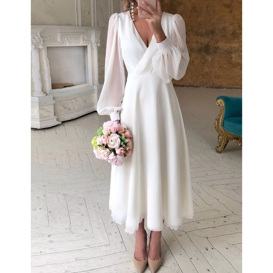 Elegancka biała sukienka midi damska