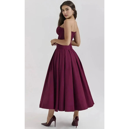Elegancka sukienka midi bez ramiączek z gorsetową górą