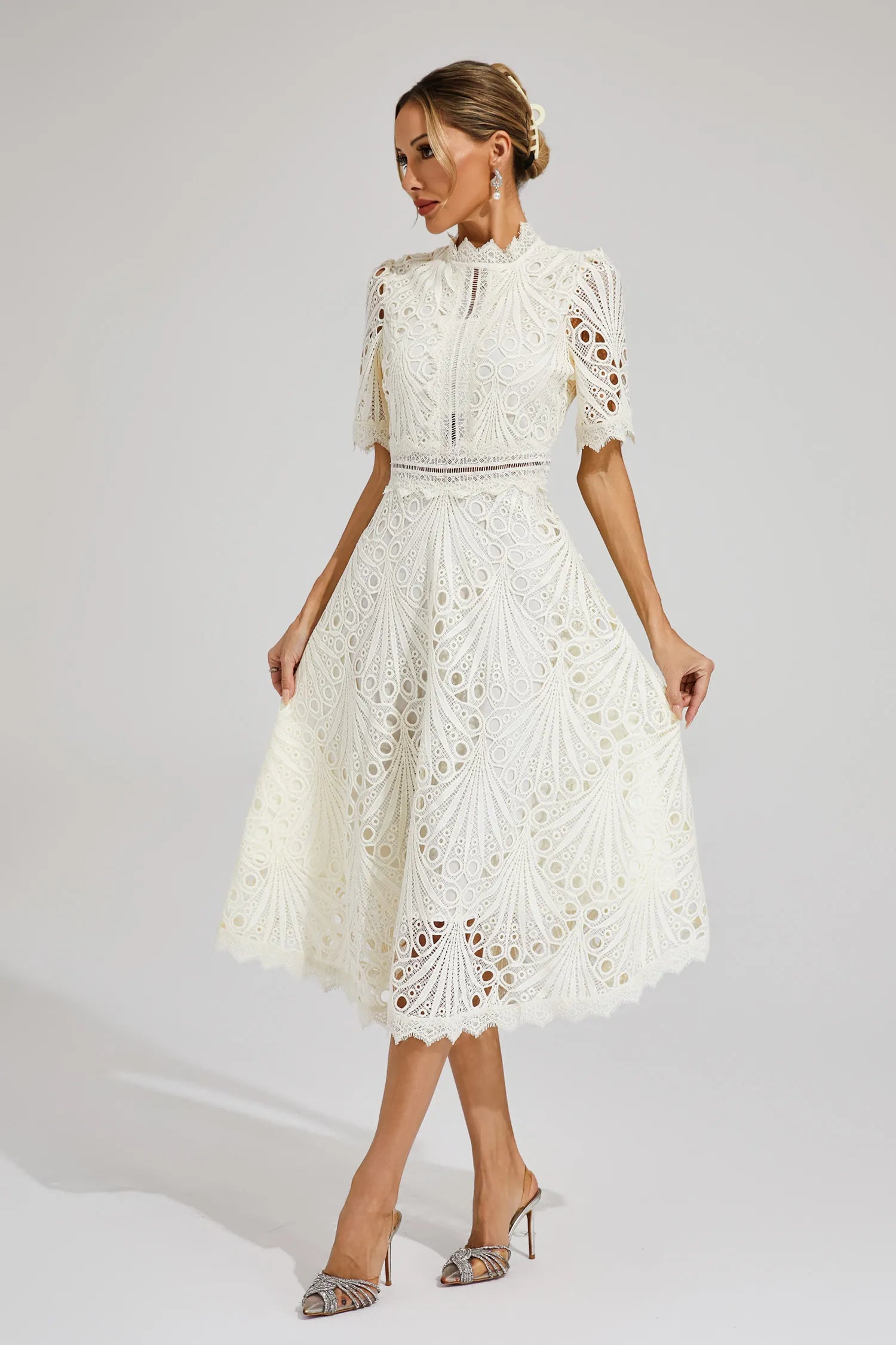 Luxe women’s midi dress featuring elegant lace details and a versatile silhouette, perfect for any occasion. 1