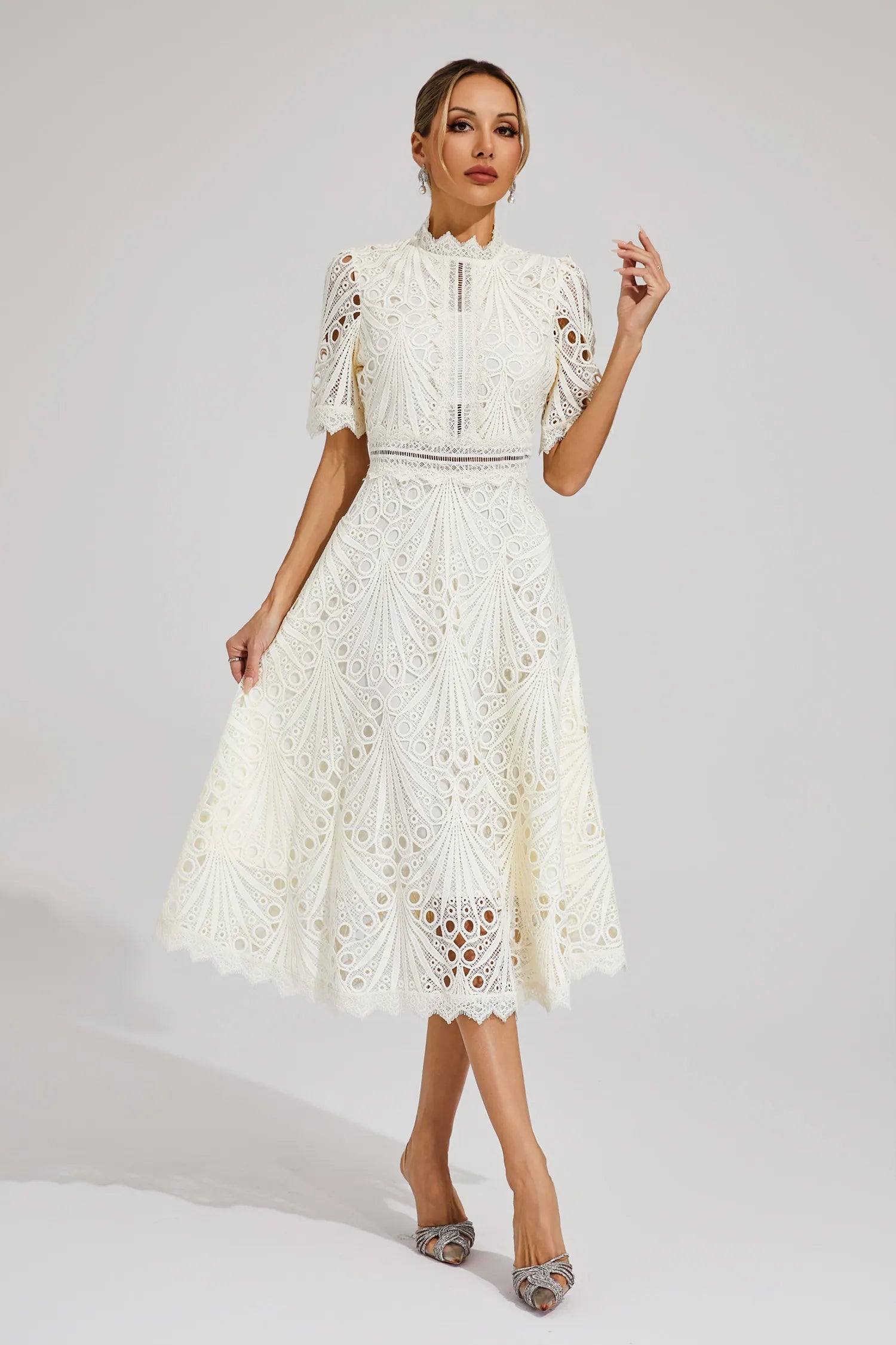 Luxe women’s midi dress featuring elegant lace details and a versatile silhouette, perfect for any occasion. 9
