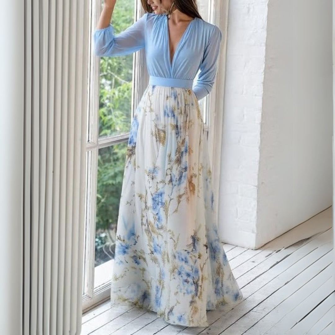 Rita Women's Maxi Dress featuring a vibrant floral print and a flowing silhouette, perfect for summer outings and casual occasions. 1