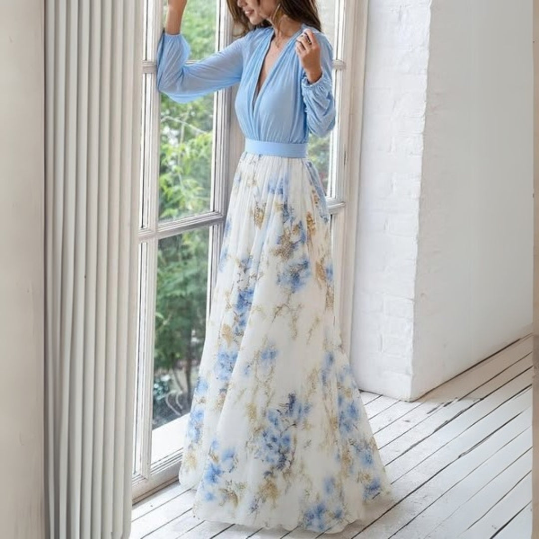 Rita Women's Maxi Dress featuring a vibrant floral print and a flowing silhouette, perfect for summer outings and casual occasions. 2