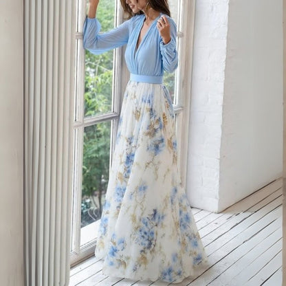 Rita Women's Maxi Dress featuring a vibrant floral print and a flowing silhouette, perfect for summer outings and casual occasions. 2