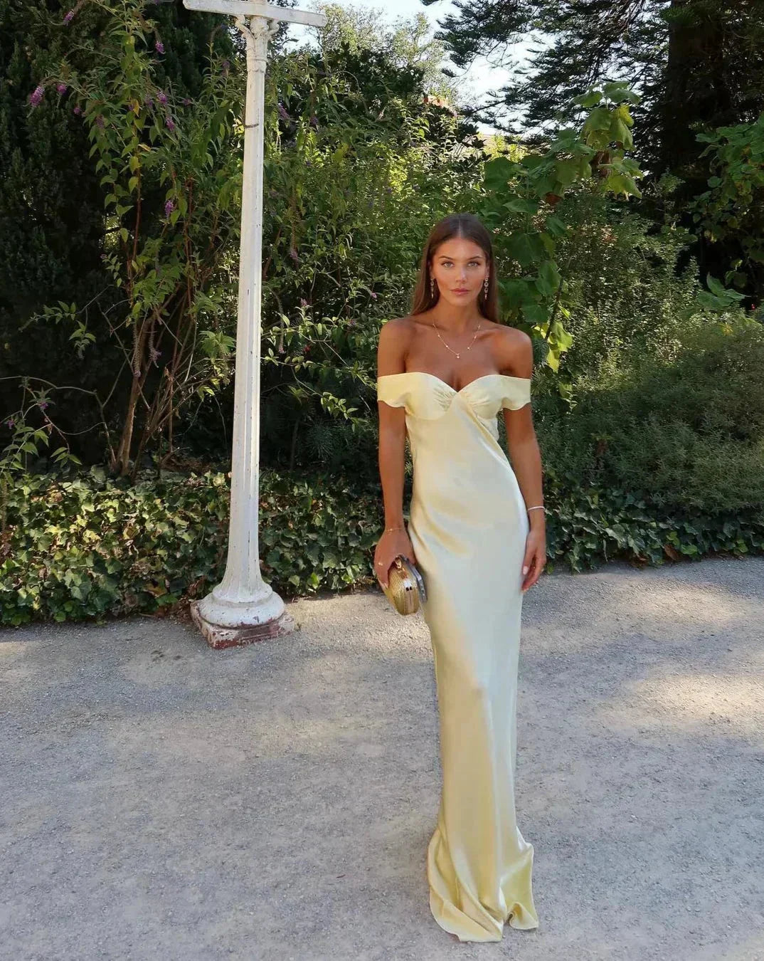 Zara Women's maxi dress featuring an elegant off-shoulder design and a luxurious satin finish, perfect for summer events and evening outings. 1